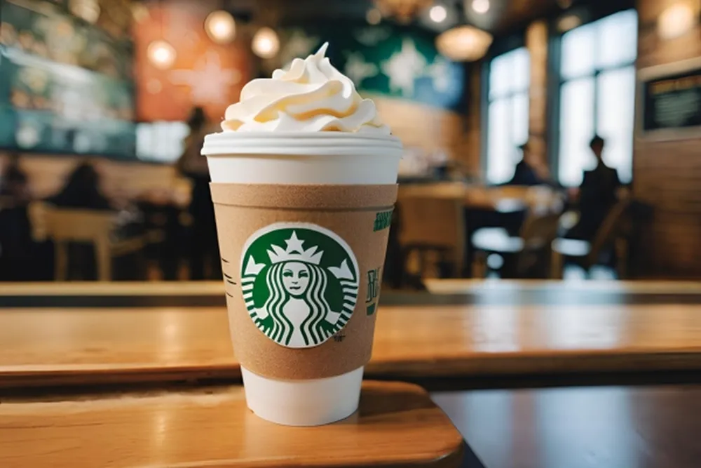 A new Starbucks latte with a twist, featured in a promotional image for the upcoming Hermitage location.