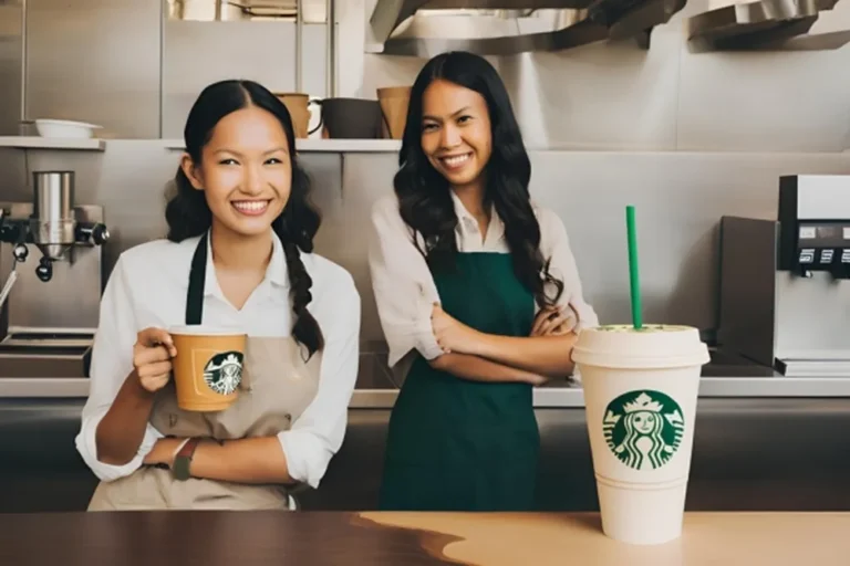 Two women smile while holding coffee cups at a Starbucks coffee shop, enjoying their time together.